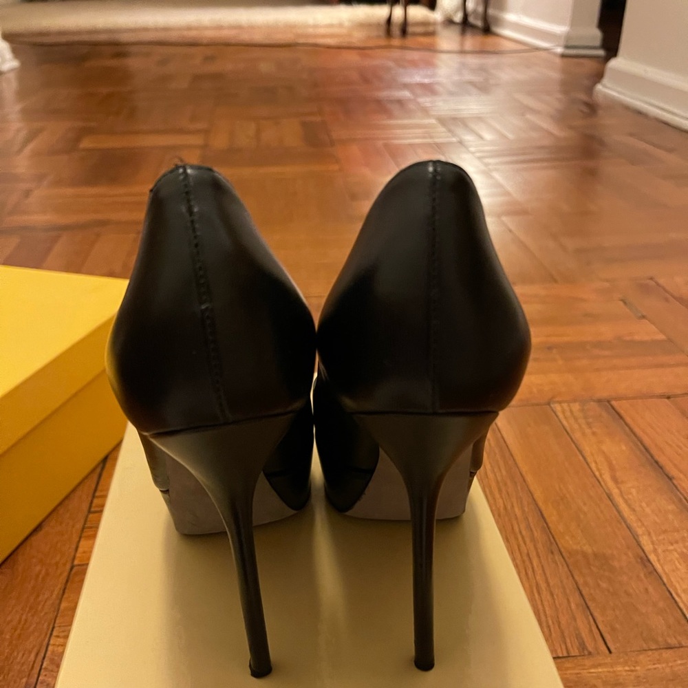 Platform pumps worn maybe once